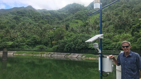 UH WRRC Director Tom Giambelluca visits one of the weather stations within the Tutuila Hydrologic Monitoring Network.